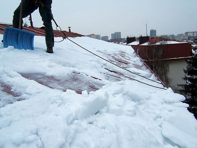 Clearing snow from the roof